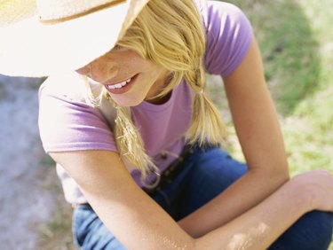 High angle view of a young woman wearing a cowboy hat