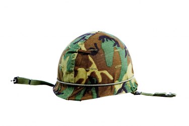 Military helmet on white background
