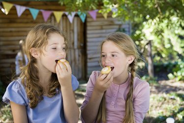 Girls eating cake