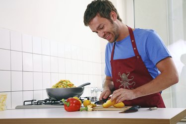 young mann cooks