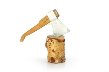 axe toy in stump