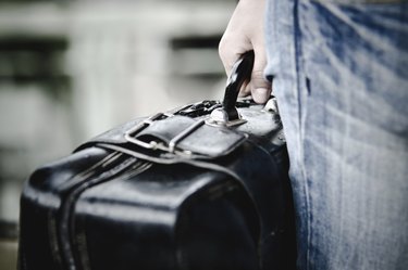 Hand holding the case