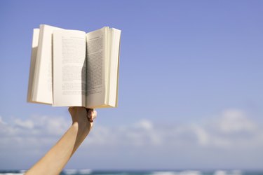 Hand holding book