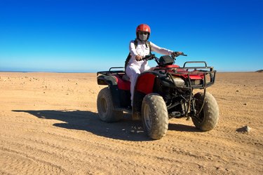 girl rides on the quad