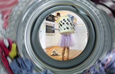 Young girl doing the laundry