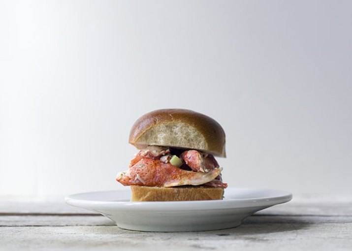 A lobster slider on a brioche roll.