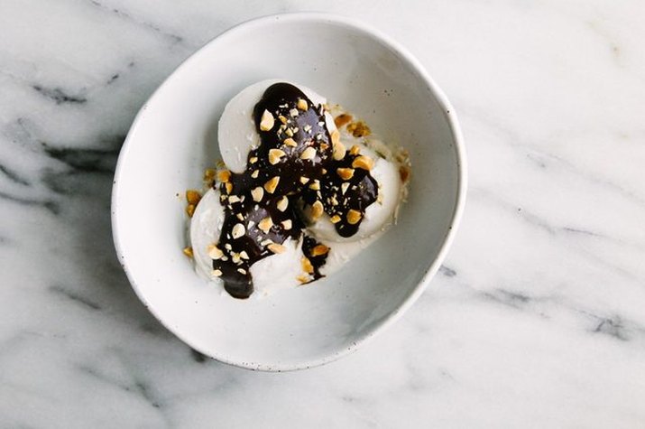 Ice cream topped with hot fudge.