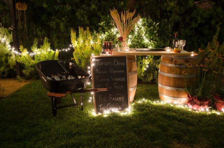 Backyard with outdoor string lights.